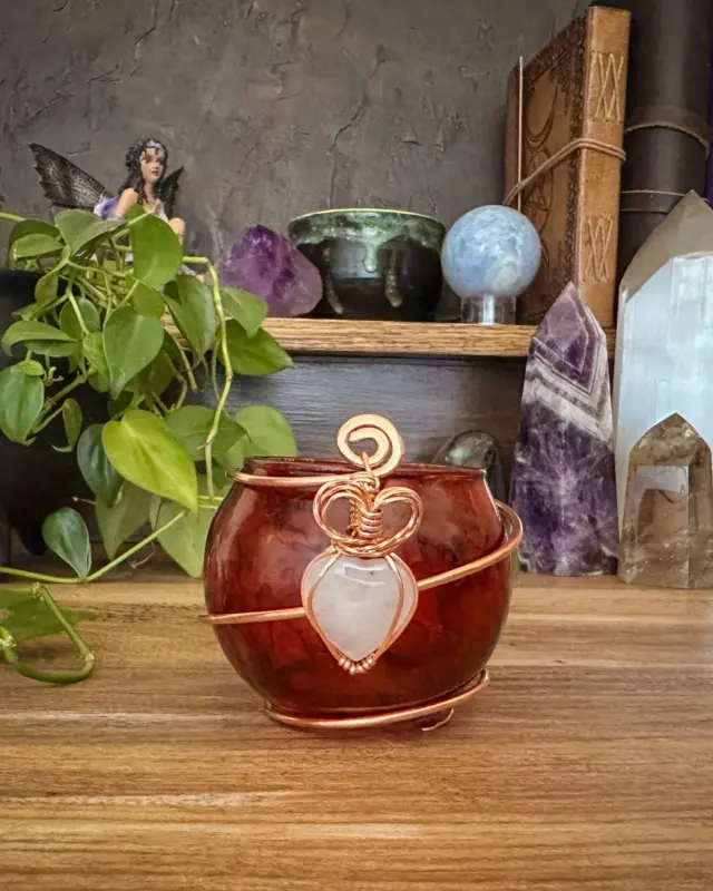 Designed to support spells of romance, self-love, and deep emotional healing, this red candleholder features a rose quartz heart and a wire-wrapped heart charm. 

Rose quartz opens the heart chakra and invites gentle yet powerful love to flow into your life.

Magickal Focus: Love, Passion, Romance, and Emotional Connection

Use during love spells, passion rituals, or any time you want to open your heart to love’s many forms—whether romantic, self-directed, or spiritual. Light your candle with intention and let the flame carry your desire into the universe, supported by blessed elements and magickal correspondences.

This and many other magickal creations available at the shop, link in bio ✨

https://herenchantedcreation.etsy.com/?section_id=32988552

#magicalcreations #makingmagic #makeeverydaymagic #magicaltools #herenchantedcreations #candleholders #everydaywitchcraft #everydaymagic #ritualtools #witchylife