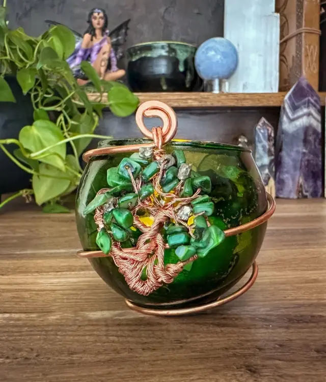 When you light this spell candle, you’re doing more than setting a flame—you’re activating your abundance. 

Let the energy of malachite and pyrite guide your intentions toward growth, confidence, and magnetic prosperity. Your success is sacred. 

Call it in.

A spark. A breath. A whisper to the Universe. The flame flickers, and with it, you envision lush abundance winding through your path—like branches of a money tree reaching toward the sun. 

Let this candleholder become a living altar to your unfolding wealth, both spiritual and material.

#magicalcreations #magicalsolutions #makingmagic #makeeverydaymagic #magictools #herenchantedcreations #everydaywitchcraft #everydaymagic #enchantedcreations #candleholders #ritualtools